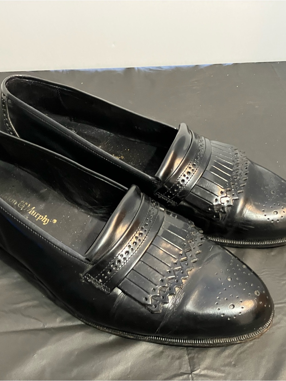 Black Men's Kiltie Fringe Penny Loafers by John G. Murphy